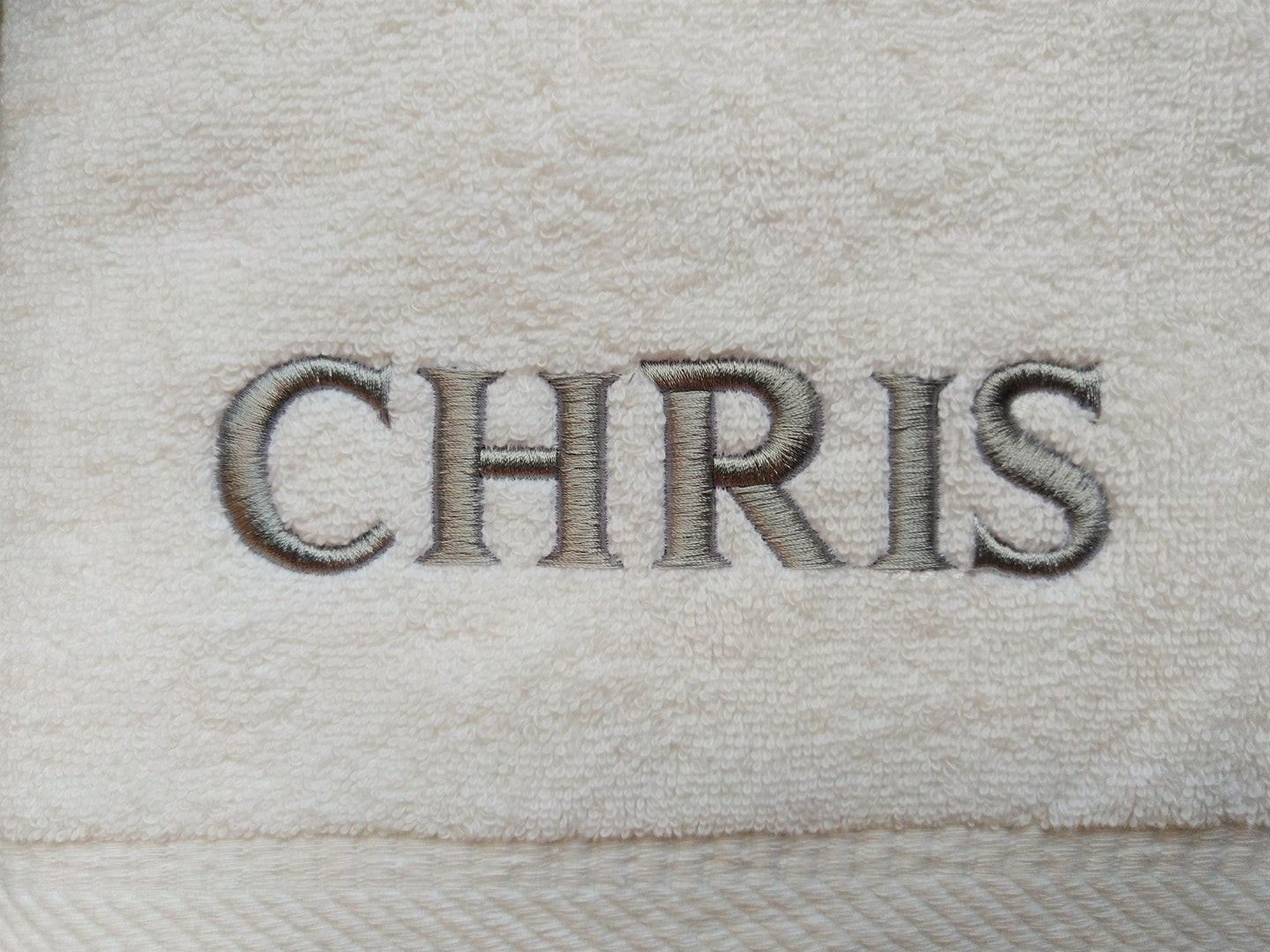 Vit badrock med brodyr